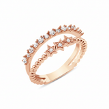 beaded star band ring in rose gold on a white background