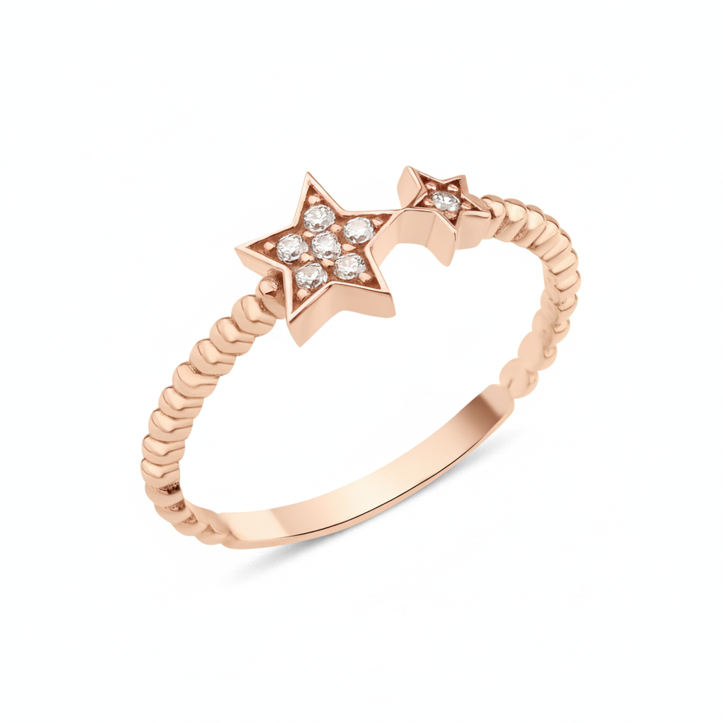 twin star ring in rose gold on a white background