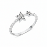 twin star ring in white gold on a white background