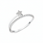 textured star band ring in white gold on a white background