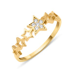star sequence ring in yellow gold on a white background
