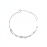 double-strand beaded chain bracelet in white gold on a white background