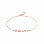 beaded bar chain bracelet in rose gold on a white background