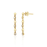 linear drop earrings in yellow gold on a white background