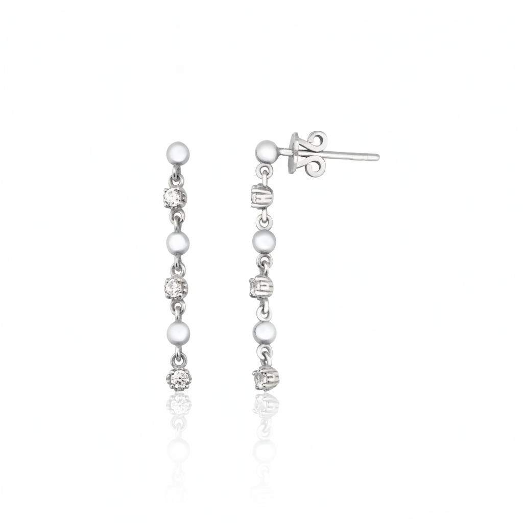 linear drop earrings in white gold on a white background