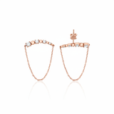 draped bar earrings in rose gold on a white background