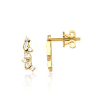 marquise ear climber earrings in yellow gold on a white background