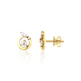 open circle stud earrings in yellow gold on a white background