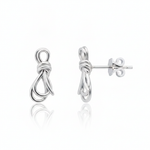 knot stud earrings in white gold on a white background
