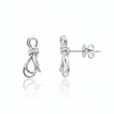 knot stud earrings in white gold on a white background