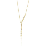 lariat necklace in yellow gold on a white background
