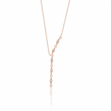 lariat necklace in rose gold on a white background