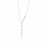 lariat necklace in white gold on a white background