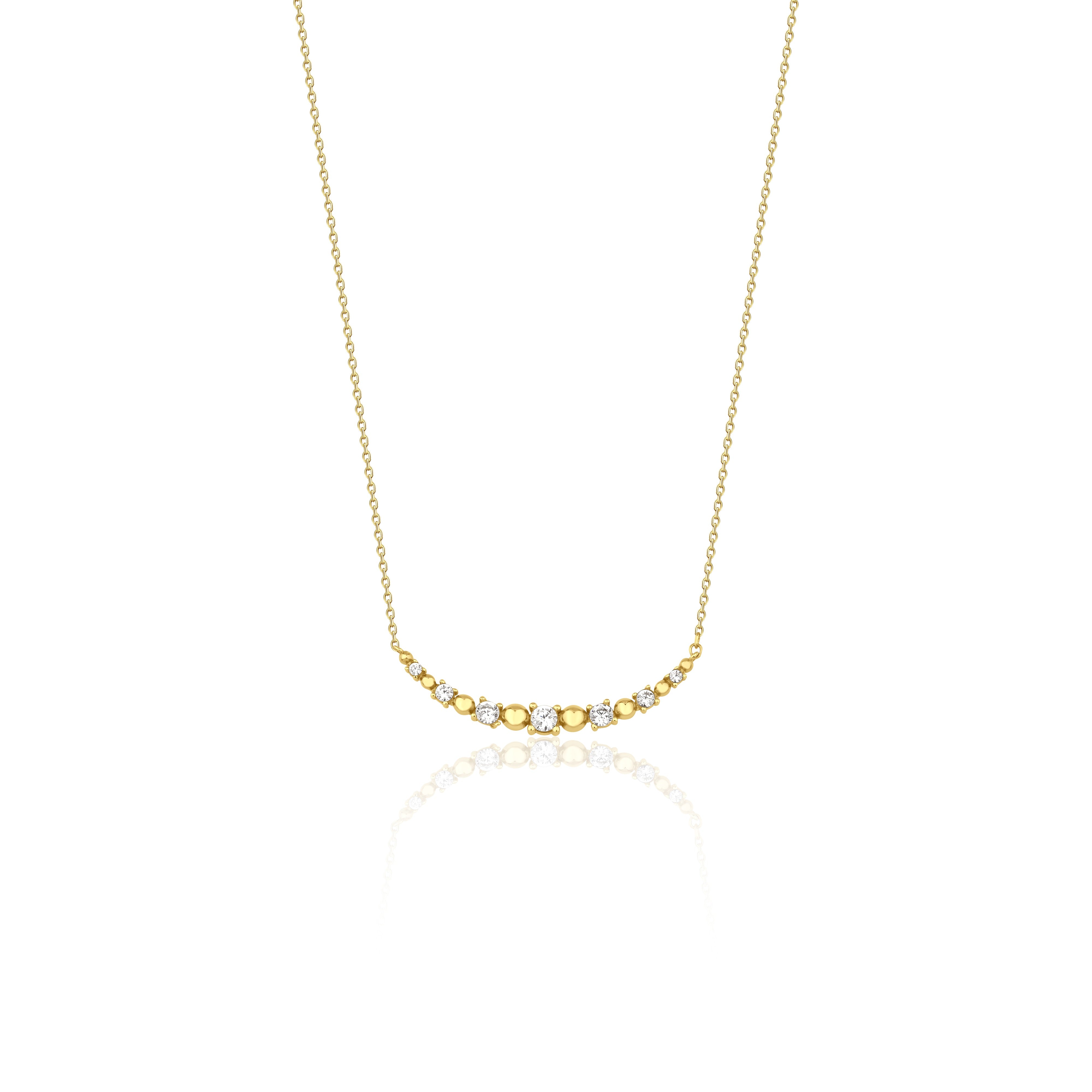 beaded arc necklace in yellow gold on a white background