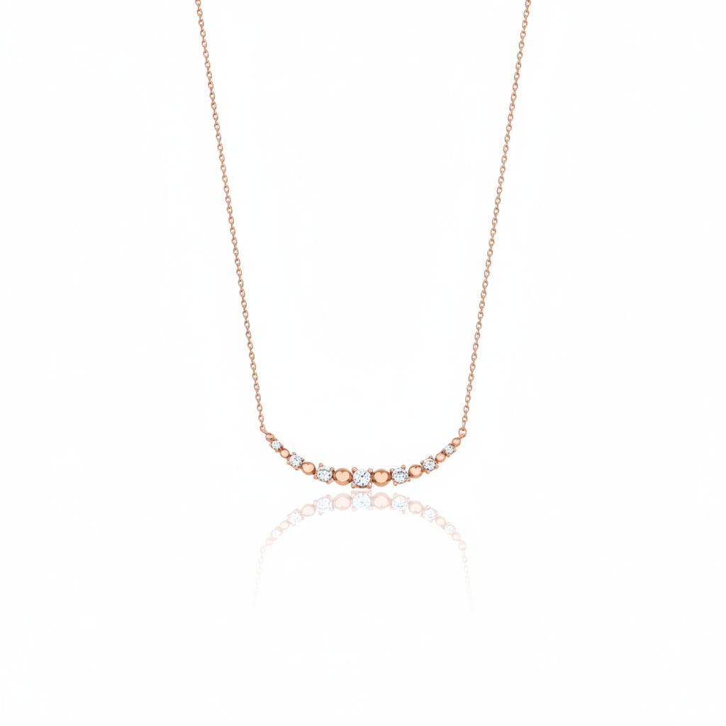 beaded arc necklace in rose gold on a white background