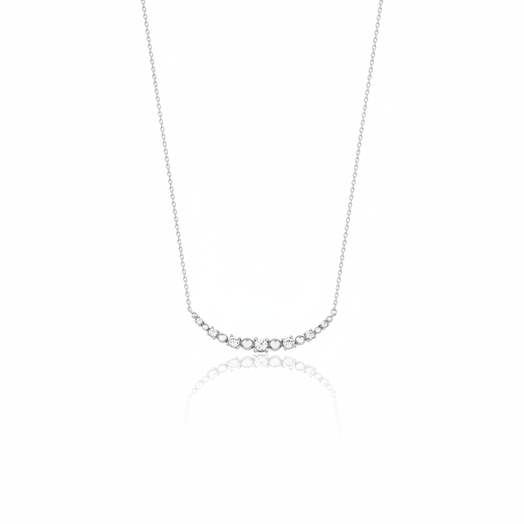 beaded arc necklace in white gold on a white background