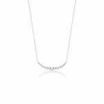 beaded arc necklace in white gold on a white background