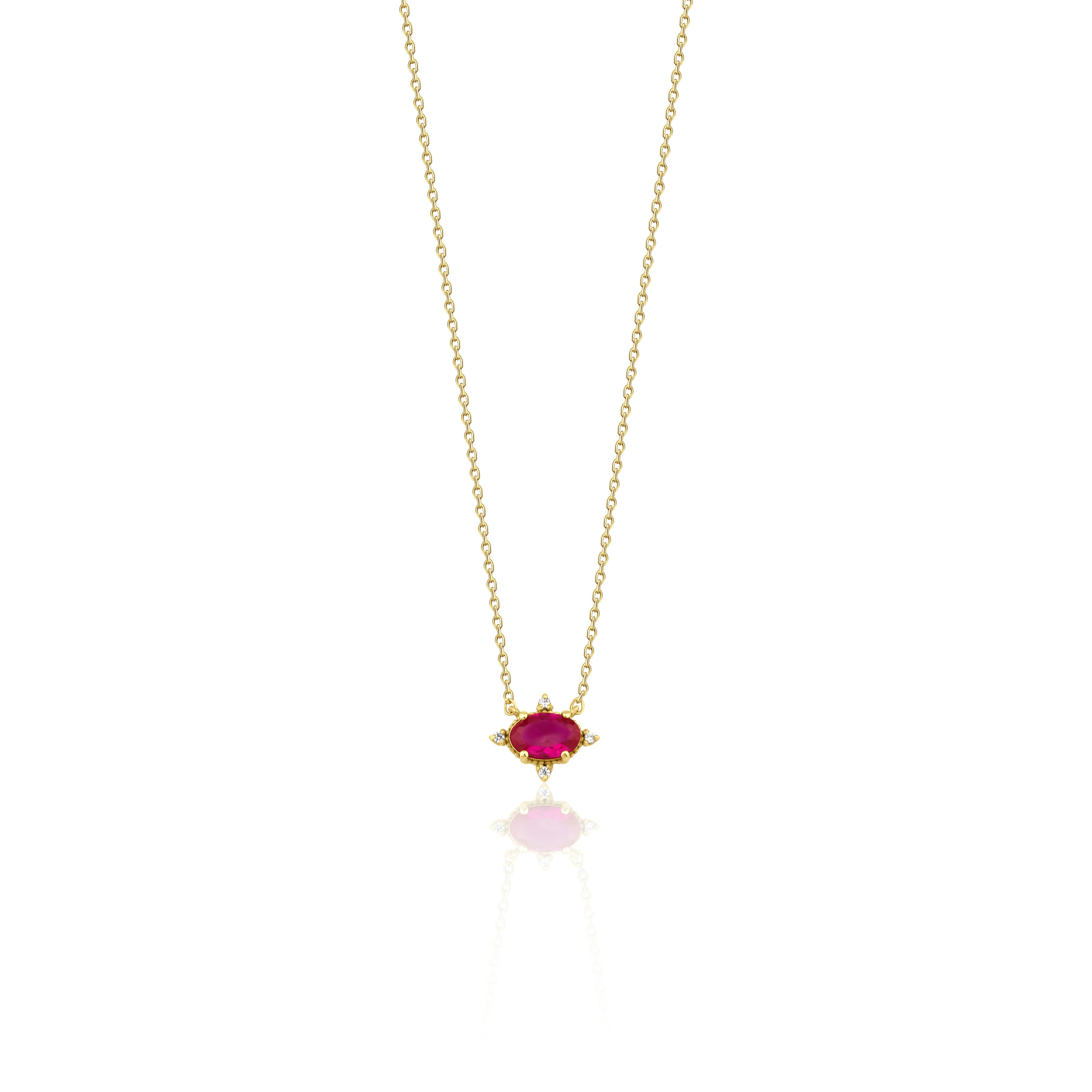 crimson pendant necklace in yellow gold on a white background