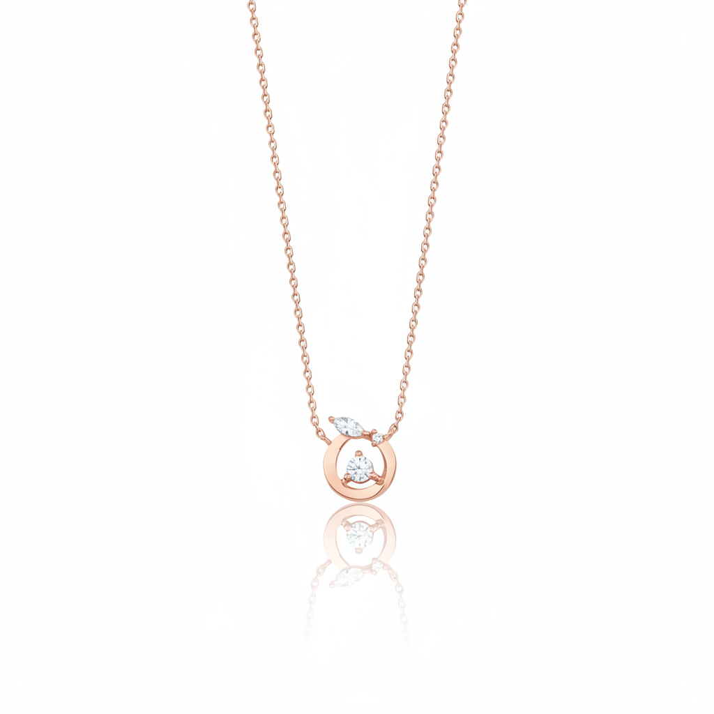 circle pendant necklace in rose gold on a white background