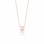 circle pendant necklace in rose gold on a white background