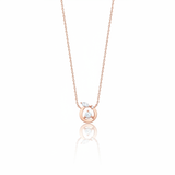 circle pendant necklace in rose gold on a white background