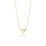 linked hearts necklace in yellow gold on a white background