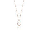 rose gold open circle pendant necklace on white background