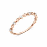 rose gold heart band ring on white background