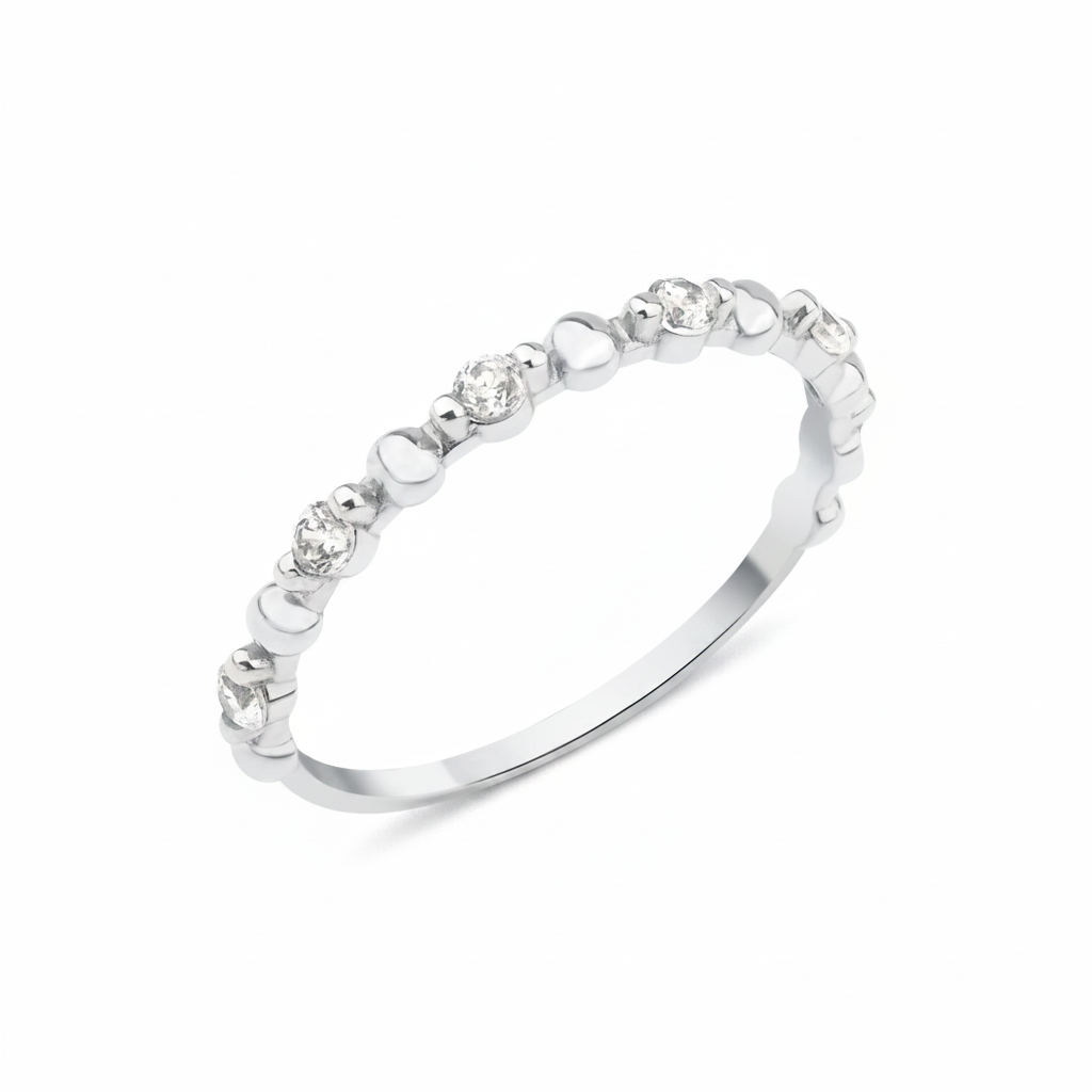 white gold heart band ring on white background