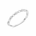white gold heart band ring on white background