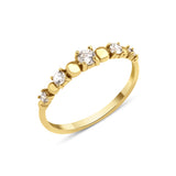 yellow gold graduated stone ring on white background