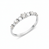 white gold graduated stone ring on white background