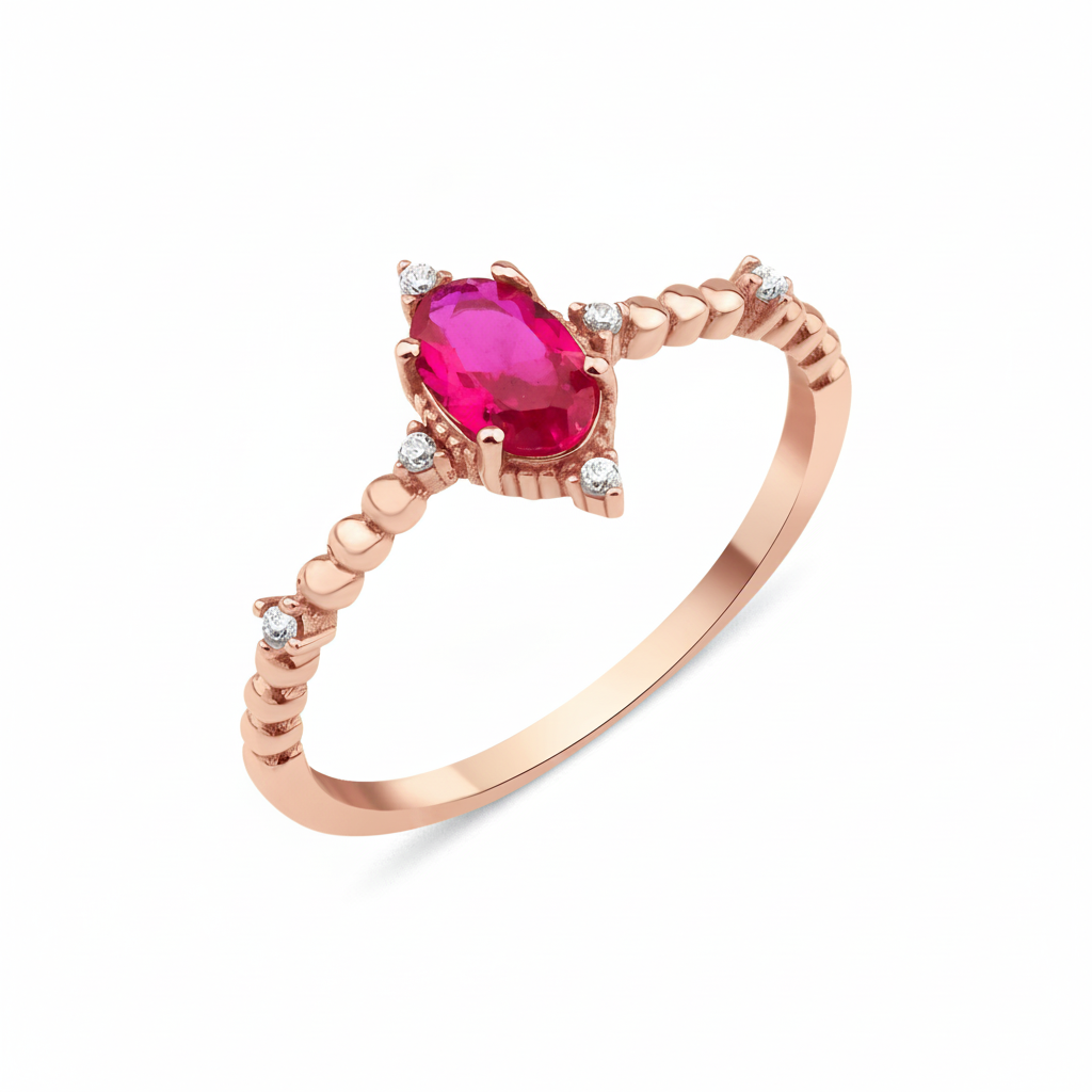 rose gold ruby accent ring on white background