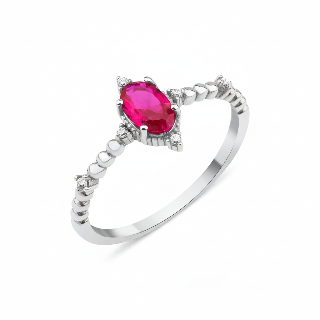 white gold ruby accent ring on white background