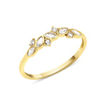 yellow gold vine crest ring on white background