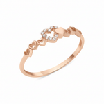 rose gold twin heart ring on white background