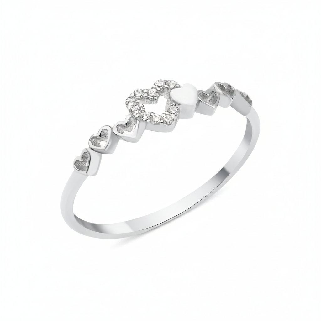 white gold twin heart ring on white background