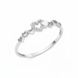 white gold twin heart ring on white background