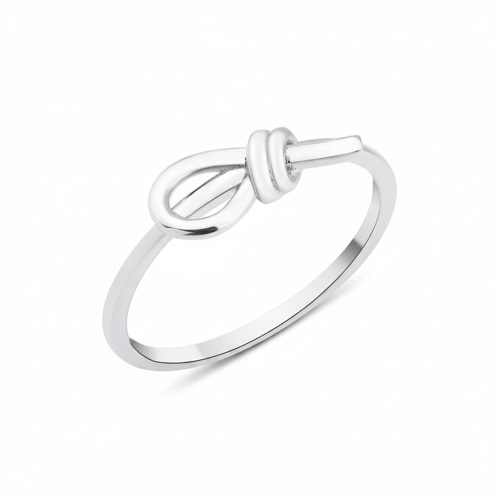 white gold knot ring on white background