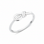 white gold knot ring on white background