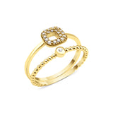 yellow gold double band ring on white background