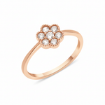 rose gold floral cluster ring on white background