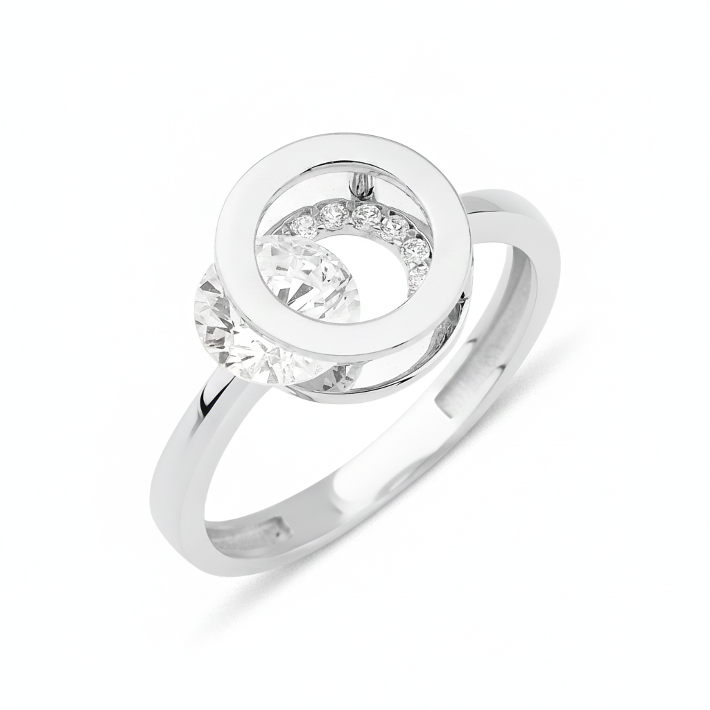 white gold orbit ring on white background