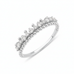 white gold beaded row ring on white background